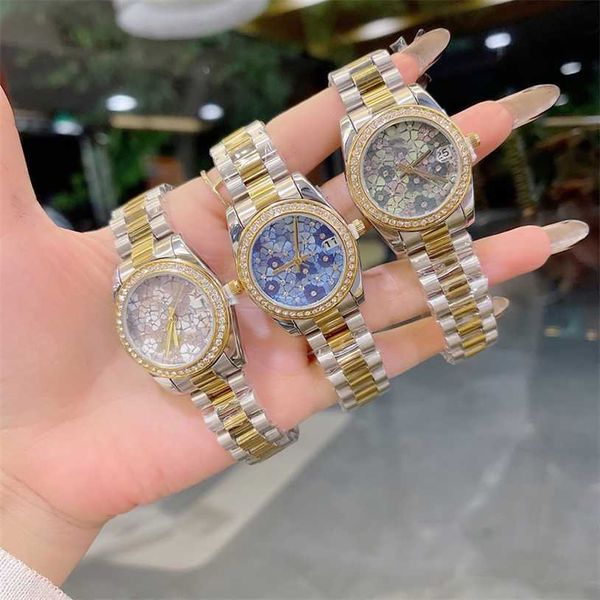 22 % Rabatt auf die Uhr, modische Damen-Mädchen-Damen-Diamant-Blumen-Stil mit luxuriösem Stahl- und Metallband, Quarzuhr RO 248