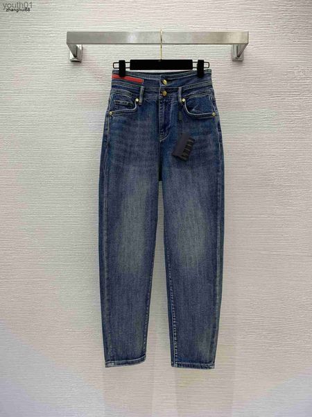 Jeans femininos designer mulheres jeans roupas de marca moda feminina cintura alta e calças elásticas finas decoradas com marca triangular 21 de dezembro novo 240304