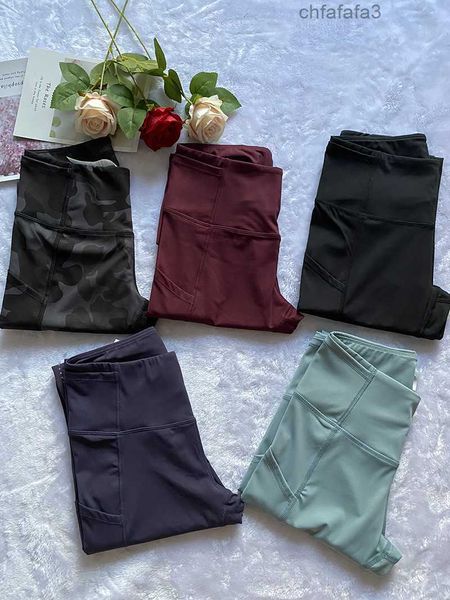 2024 Lu Lemen Donna Due Tasche Ritagliate Biologia Yoga Pantaloni Fitness Leggings Collant Vita alta Corsa Capris Allenamento Palestra Abbigliamento Abbigliamento sportivo X4VD