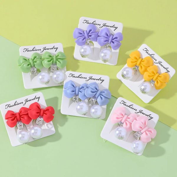 Crianças clipe de orelha estilo coreano doce colorido bowknot sem piercing brinco para meninas do bebê pérola balançar anel crianças jóias 240226