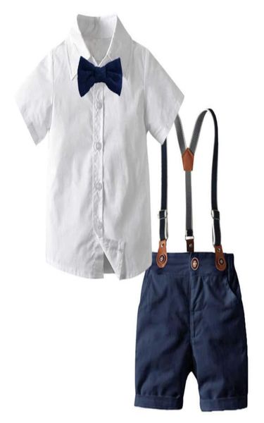 Junge Schleife Gentleman Kleidung Weißes Hemd Nary Shorts mit Hosenträgern Kinder Kinder Urlaub Outfits Kurzarm Sets X07199577062