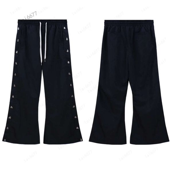 Pantaloni da uomo neri di design con bottoni in nylon Pantaloni da uomo di alta qualità Jogger Moda Hip Hop Pantaloni lunghi casual Lovers Street Tuta