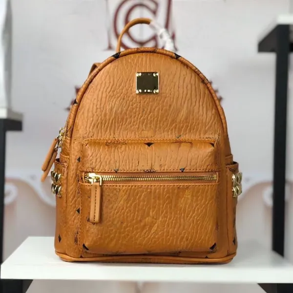 Designer quente mochila designer de luxo mochila das mulheres dos homens mochila de viagem rebite decorativo prego lateral fivela plana flores velhas mochila de couro nappa