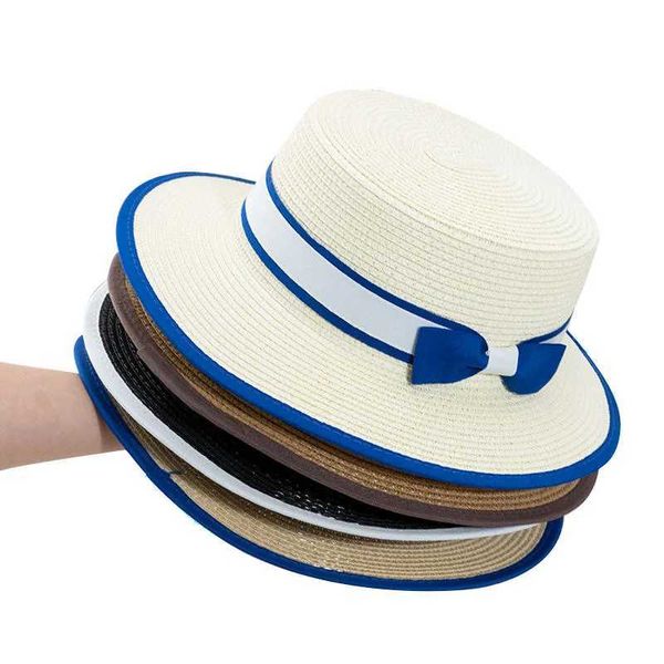 Cappelli a tesa larga Cappelli a secchiello New Summer Womens Rowing Beach Hat Wide Silk Womens Casual Panama Hat Womens Classic Flat Bow Knot Cappello di paglia J240305