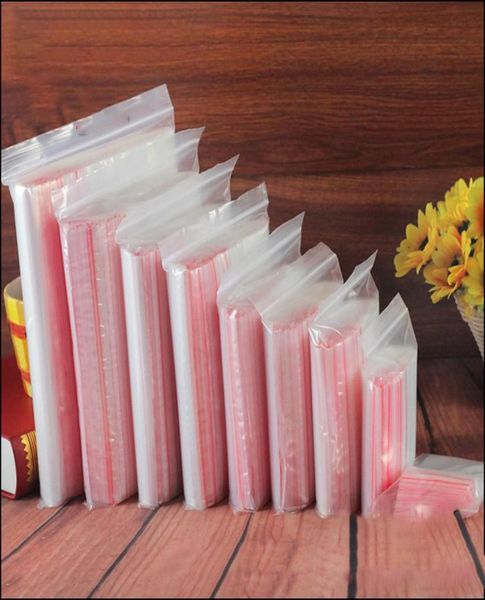 100 pçs vários tamanhos pequenos zip lock sacos de plástico reclosable transparente armazenamento contas saco de jóias natal doces lanche sacos 1953802