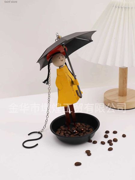 Objetos Decorativos Estatuetas Novo personagem segurando guarda-chuva amarelo menina alimentador de pássaros de metal ao ar livre pendurado alimentador de ferro artesanato T240306