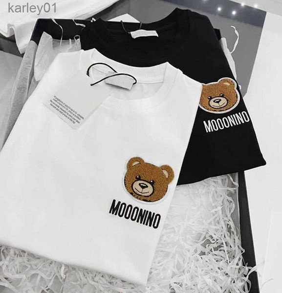 T-shirt T-shirt moda per bambini Top T-shirt ragazzi ragazze cartoon orso lettera ricamata in cotone manica corta Pullover vestiti per bambini Stile sciolto 240306