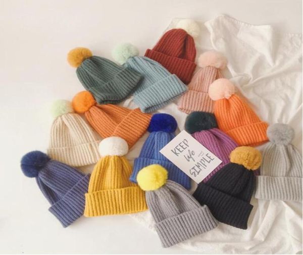 Bambino caldo colori solidi cappelli di coniglio capelli pompon berretti bambini bambini protezione per le orecchie imitazione vento cappello lavorato a maglia ragazzi ragazze lana be9409049