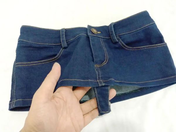 Saia feminina aberta virilha borla lápis micro mini jeans saia apertada quadril pacote fino saia quadril botão virilha inferior wear clube dança