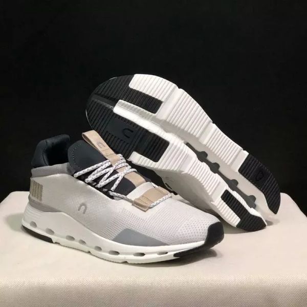 2024 Nuovi designer di spedizioni gratuite uomini e donne uomini leggeri shock che assorbono comodi scarpe sportive traspiranti scarpe da tennis scarpe casual con scatola