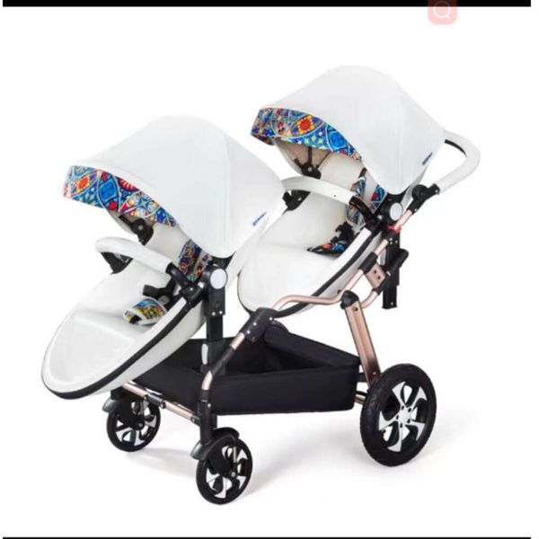 Kinderwagen Zwillinge Baby Luxus Pu-Leder Weiß Zwillingswagen Doppel-Eierschalenauto Verkaufen wie warme Semmeln Designer Beliebte elastische Mode 360-Grad-Drehung