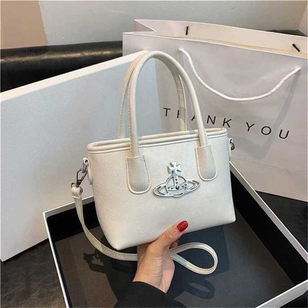 70% tomada de fábrica fora do nicho francês super quente bolsa pequena para mulheres estilo high-end cruz corpo balde bolsa à venda