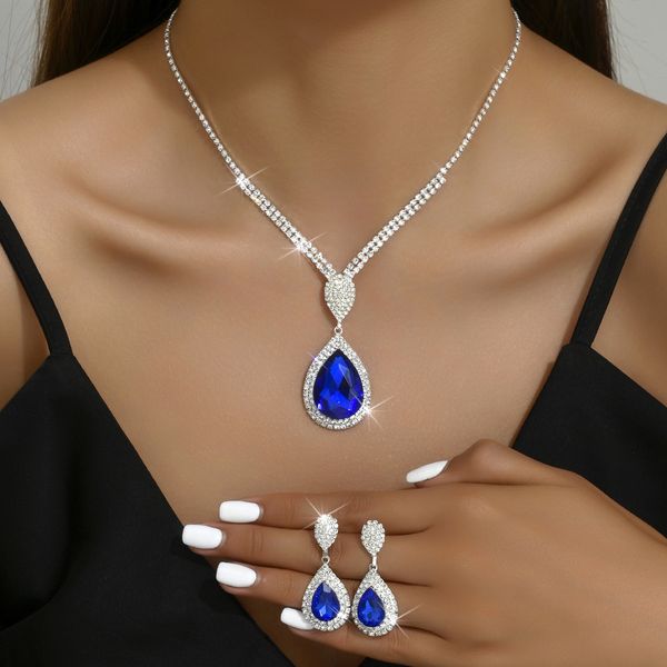 Set di gioielli in cristallo a goccia alla moda Set di gioielli con orecchini di collana di strass rosso blu scintillante per accessori di abbigliamento da sposa da damigella d'onore