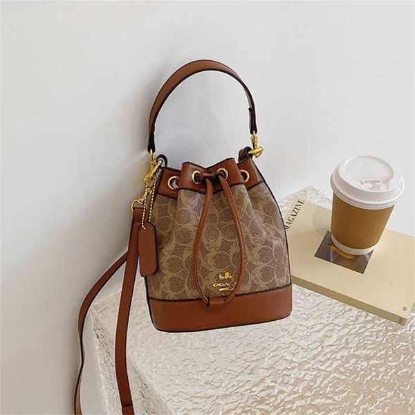 Outlet di fabbrica del 70% di sconto sulla borsa a secchiello Old Flower in live streaming da donna con borsa a tracolla stile portatile con coulisse in vendita