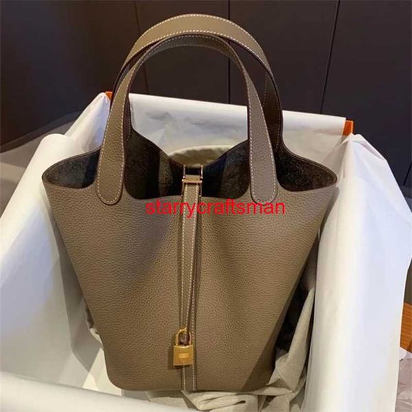 Borse con manico superiore Borsa Picotin Lock 1822 Borse autentiche Famiglia 2024 Nuovo secchiello per l'acqua Cestino per cavoli Borsa da donna in vera pelle Versatilhave logo HBNILD