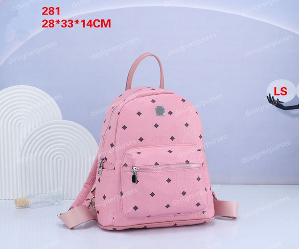 MC mochila de couro bolsa de ombro designer de luxo sacos de escola mulheres homens back pack sacos de embreagem tecido moda totes bolsas saco de livro punk rebite estrela 28cm wyg