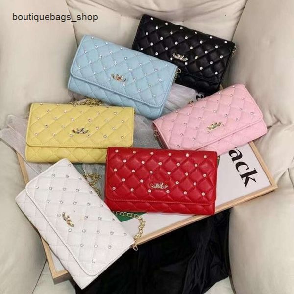 Loja de fábrica loja direta outono e inverno novo balde de água saco na moda feminina grande capacidade bolsa axilas elegante diamante grade corrente bloqueio fivela