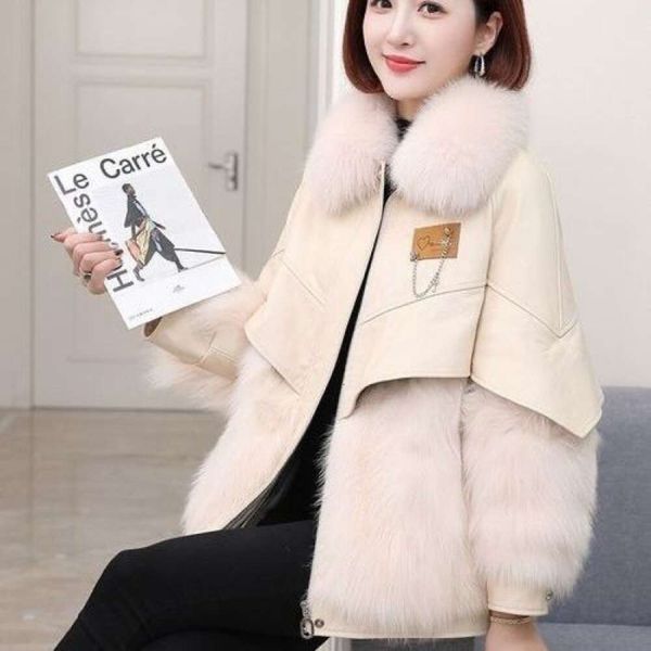 Cappotto Haining in pelle per donna 2023 inverno nuova versione coreana PU imitazione pelliccia di volpe lunghezza media 661363