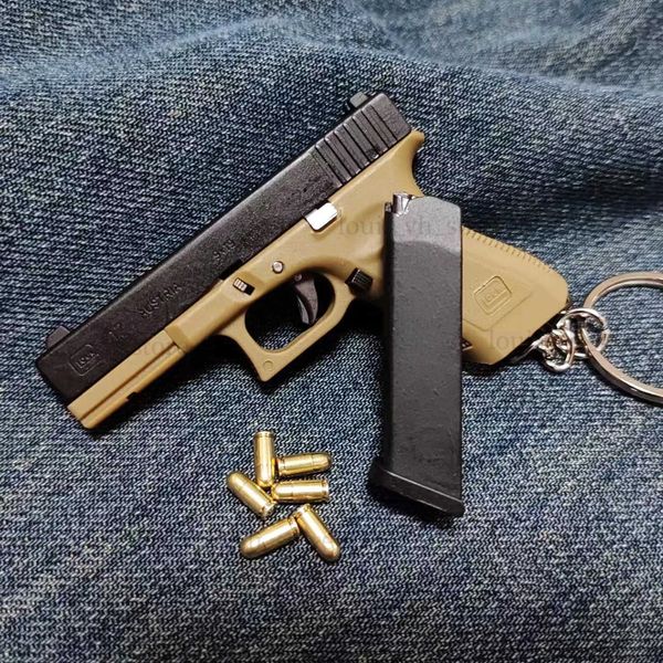 Arma brinquedos liga império g17 g34 pistola modelo escudo ejeção 1/3 mini arma de brinquedo arma chaveiro metal falso arma montagem com coldre t240309