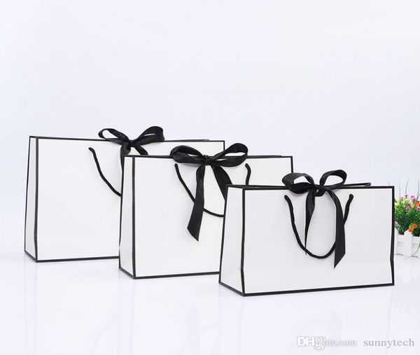 Design creativo Grande bordo nero Sacchetto di carta kraft bianca con manico Sacchetto regalo di carta bowknot per bomboniere nuziali LX014802585841