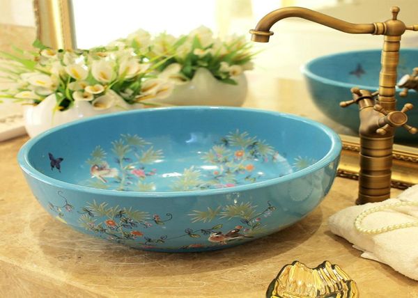 Lavatórios de cerâmica bancada pia do banheiro pias redondas moda lavatório pia arte cerâmica lavatório flor e pássaro blue1095645