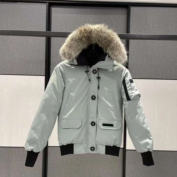 Piumino pilota da uomo canadese di design Vera pelliccia di lupo con cappuccio Parka in tela Lettera Patch caldo spesso Outwear Donna Cappotto invernale d'oca 73ck