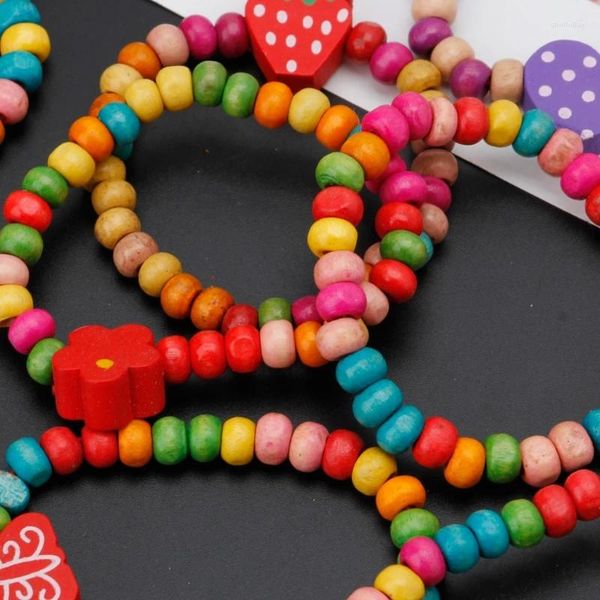 Braccialetti con ciondoli 12 pezzi Decori elasticizzati per bambine in legno colorato