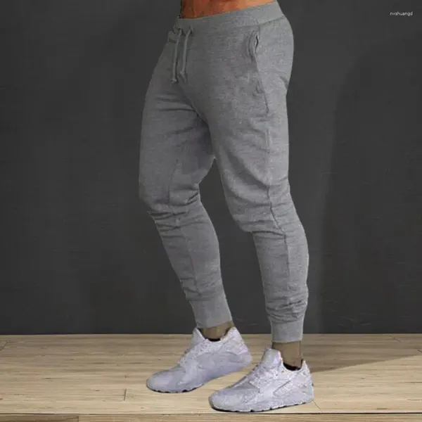 Calças masculinas Slim Fit Sweatpants com cintura de cordão macio respirável tecido tornozelo-banded design para ginásio jogging sólido