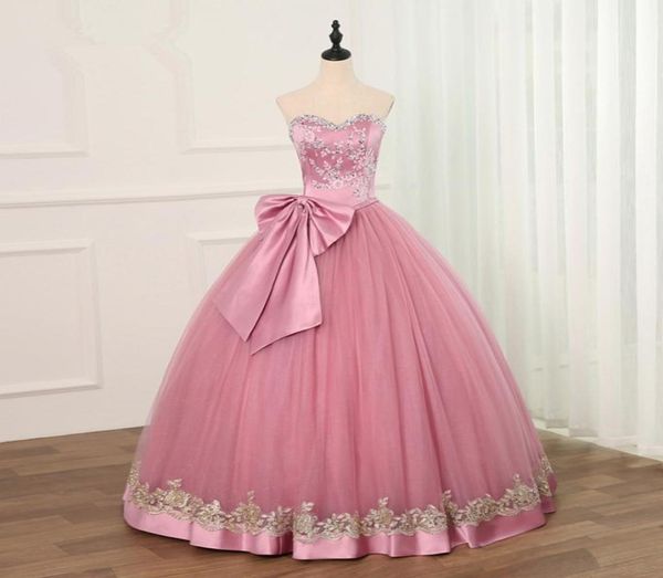 2019 Principessa rosa applicazioni di cristallo abito di sfera abiti Quinceanera fiocco paillettes dolce 16 abiti debuttante 15 anni festa formale Dres4188963