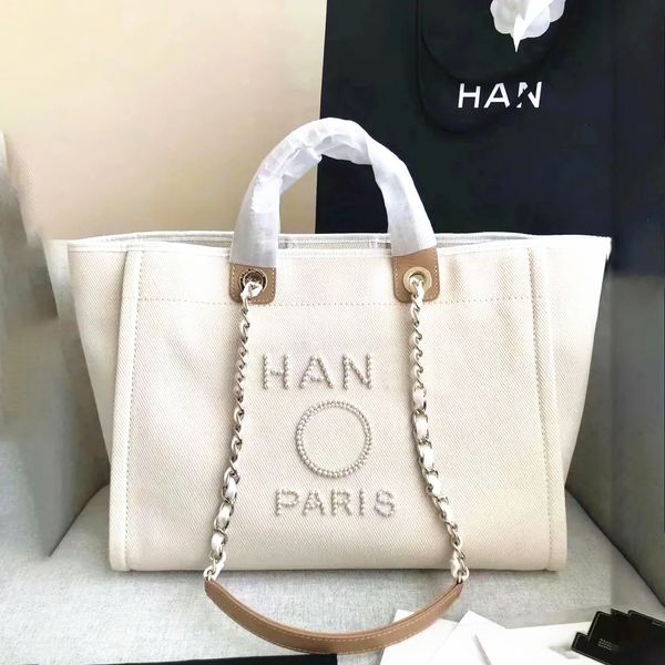 Luxurys Duffle deauville yaz plaj çantası tote alışveriş çantası mektubu kabartmalı moda kadın adam el çantası bayan inci tuval tasarımcısı çapraz vücut debriyaj omuz çantaları