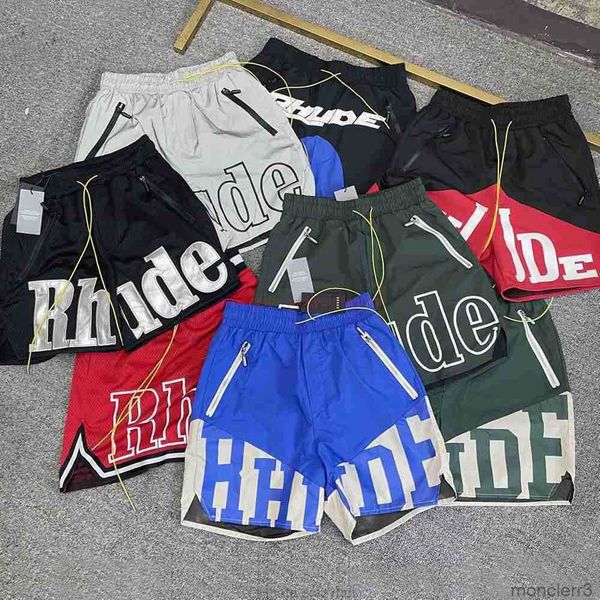 Designer Short Fashion Abbigliamento casual Pantaloncini da spiaggia Versione alta Rhude Lettera Maglia ricamata Ritagliata Arcobaleno Pantaloni sanitari da donna per uomo 3m Anti Amer Dmiu