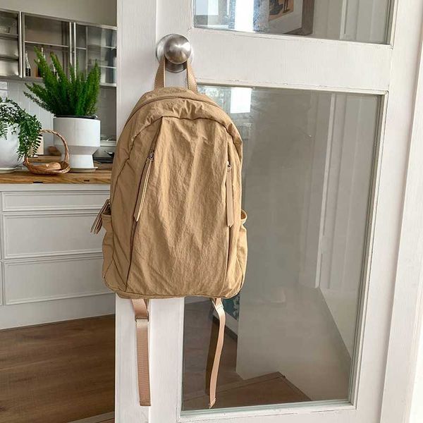 Hbp não marca 2024 atacado quente creme estudante mochila leve simples moda meninas grande capacidade material de náilon mochila