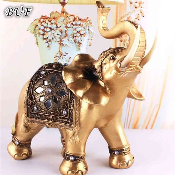 Statua di elefante in resina dorata Feng Shui elegante tronco scultura fortunata ricchezza figurine ornamenti artigianali per la decorazione domestica 210827314o