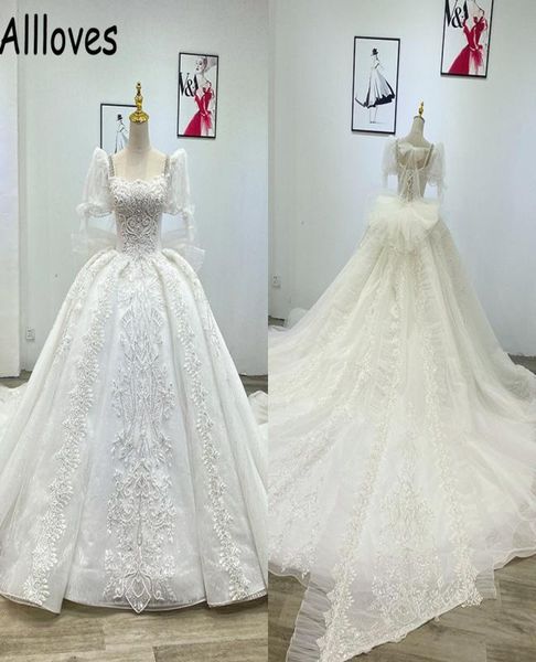 Royal Ball Kleid Hochzeitskleid mit Puff Kurzärmele Prinzessin Formal Zeremonie Kirche Brautkleider Luxusperlen Kristalle Perlen 1370317