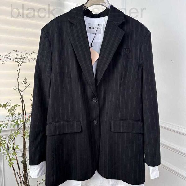 Ternos femininos Blazers designer início da primavera novo Miu Nanyou Gaoding estilo britânico único breasted lã emenda falso de duas peças solto terno jaqueta L9AZ