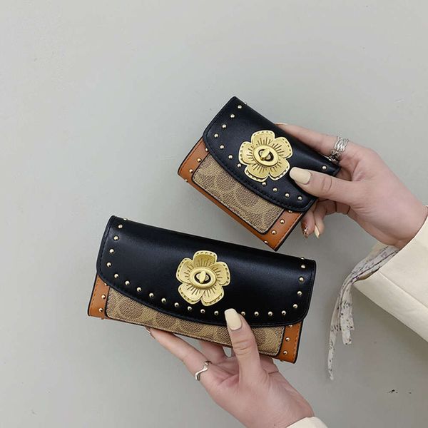 Shoppen Sie Factory Wholesale Camellia Short Folding Wallet Womens 2024 New Multi Card Big Money Fashion Vielseitig Small Function