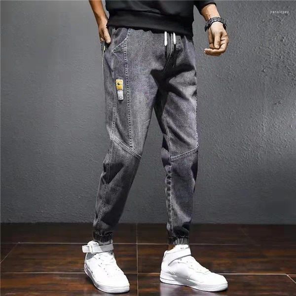 Pantaloni da uomo Primavera Autunno Moda Jeans larghi Uomo Harem Coreano Trendy Casual Piedi legati Pantaloni da pendolarismo maschile di grandi dimensioni