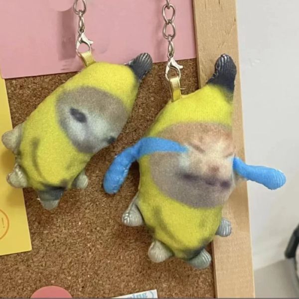 Brinquedos 1/2 pçs kawaii banana gato pingente de pelúcia bonito chorando gato banana engraçado chaveiro saco de carro pingente chaveiro presentes para colega de classe