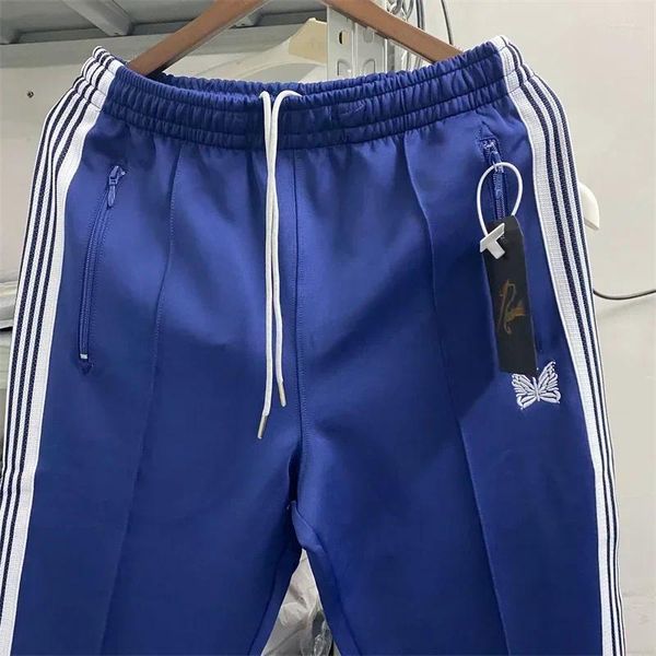 Calças masculinas 23ss estilo agulhas jogger mulheres casual webbing estiramento calças borboleta bordado cordão bermudas