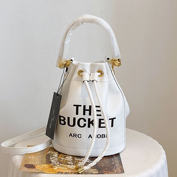 Designer-Tasche The Bucket Bag Abendtaschen Schultertaschen Damen Schulterhandtaschen Tragetaschen Designer Mode Berühmte Umhängetasche Großhandel Prägung Kordelzug 555