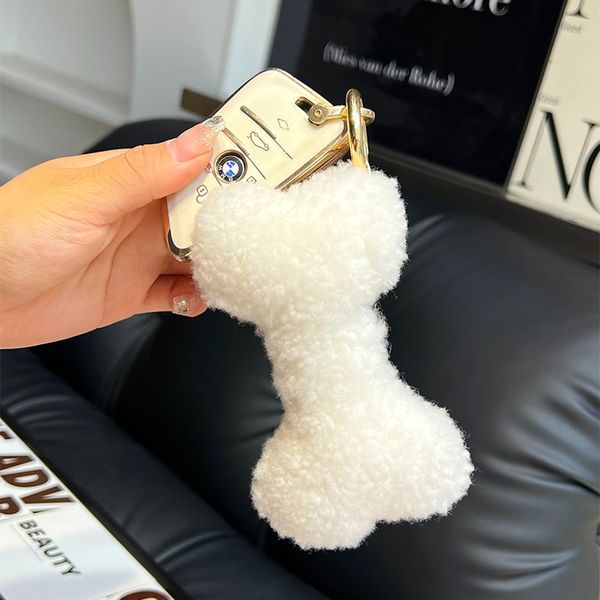 Bonito real shearling pele osso chaveiro crianças boneca pompom saco peludo pingente presente