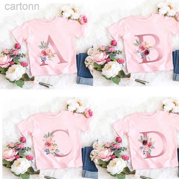 T-Shirts Yeni Pembe Çiçek Mektubu A B C D Çocuklar T-Shirt Kawaii T Shirt Anime Karikatürleri Gündelik Kıyafetler Çocuk Kız Kısa Kollu Üst Tee LDD240314