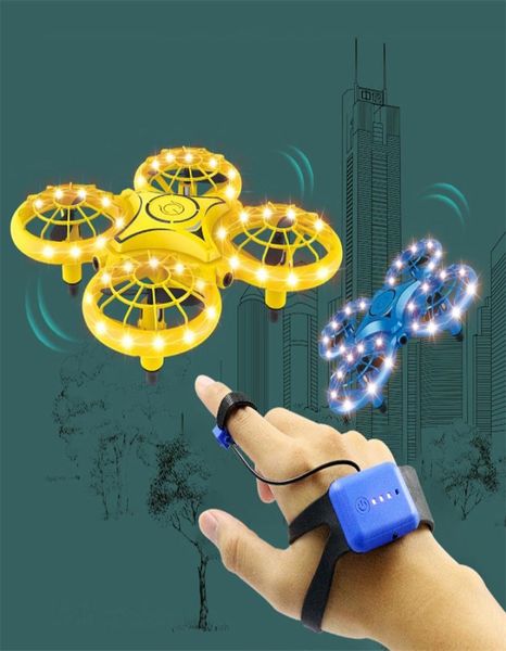 Drone de indução de quatro eixos relógio inteligente gesto de sensoriamento remoto rc aeronaves ufo somatossensorial interação noctilucente brinquedos2488173