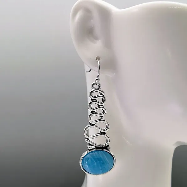 Orecchini pendenti Vintage Twist Metallo Pietra blu per le donne Gioielli Boho Colore argento Scava fuori l'orecchino a forma di onda