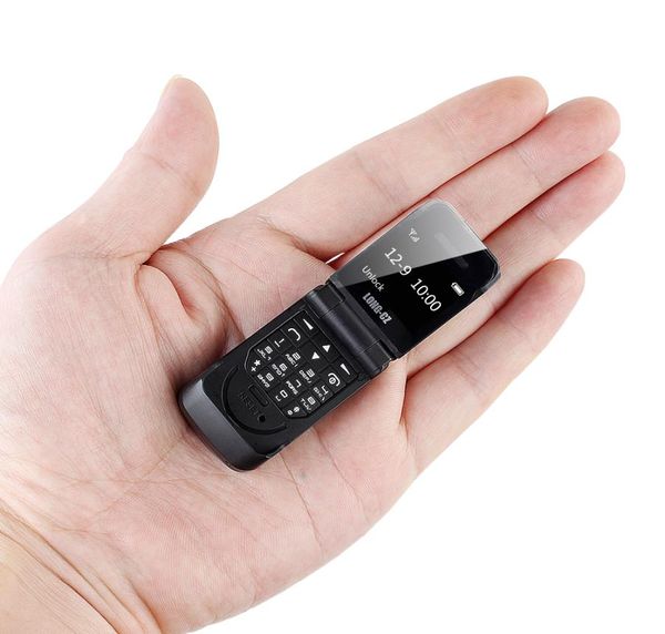 Entsperrte Mini-Flip-Handys J9 066quot Kleinstes Studenten-Handy Drahtloser Bluetooth-Dialer FM Magic Voice Hands Earp7525907