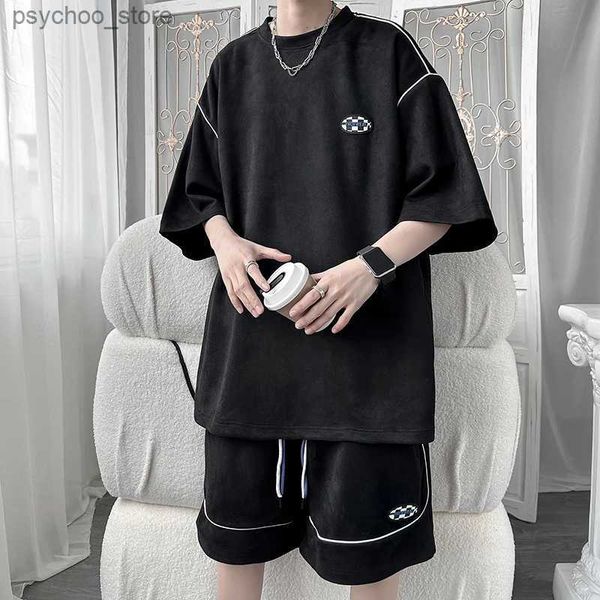 Tute da uomo Nuova estate 2023 da uomo in due pezzi di cotone casual T-shirt e pantaloncini set abbigliamento sportivo da uomo moda a maniche corte abbigliamento da pista Q240314