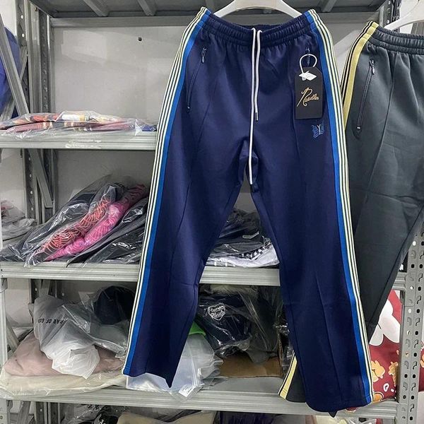 Calças masculinas Agulhas Cordão Homens Mulheres Faixa Bordada Borboleta Sweatpants AWGE Calças Hip Hop