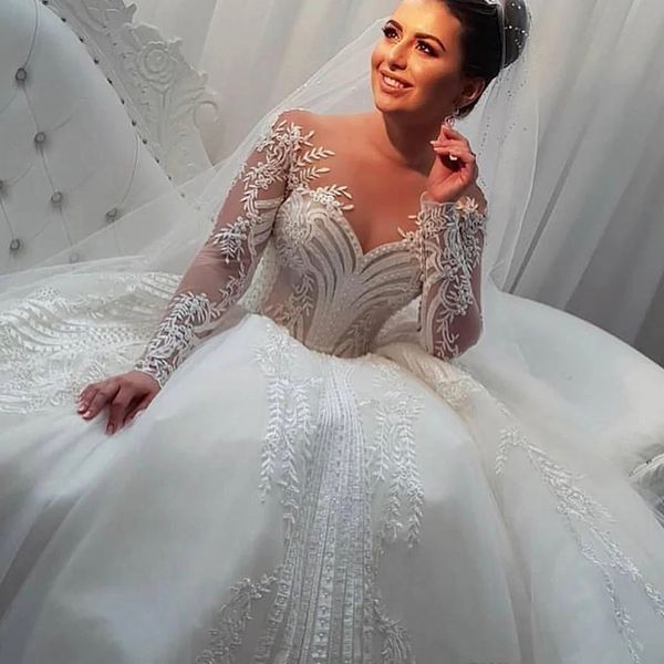 Dubai Prinzessin Brautkleider Lange Ärmel Spitze Applikationen Perlen Perlen Elfenbein A-Linie Brautkleider Sheer Neck Arabisch Modernes Brautkleid 2024