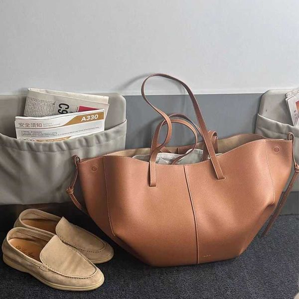 Bolsa tote pol de nicho francês, nova bolsa de couro Cyme, bolsa mãe de couro genuíno de grande capacidade, bolsa feminina 240315