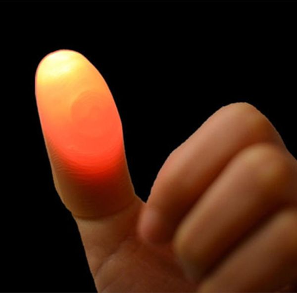 Engraçado novidade lightup polegares led luz piscando dedos truque mágico adereços incrível brilho brinquedos crianças presentes luminosos dbc bh306996777